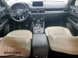 2018 Mazda CX-5 Touring z VIN JM3KFACM0J0469433, wystawiony jako Copart lot #54349955 z przebiegiem Nie podano mil oraz Szkoda całkowita • Salvage title. Historia ofert i sprzedaży dostępna na DreamBid. Obrazek 8.