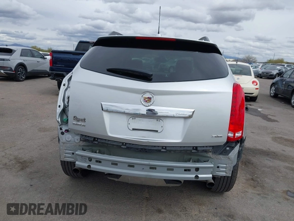 2015 Cadillac SRX with VIN 3GYFNAE34FS629258, listed as a IAAI auction lot 41788601 with 56,939 mi miles and . Bid and sale history available at DreamBid. Image 17.