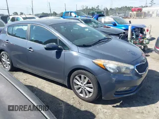 2015 Kia Forte 5-Door EX with VIN KNAFX5A80F5295035, listed as a IAAI auction lot 41797837 with 112,044 mi miles. Bid and sale history available at carsss.com. Image 1.