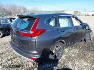 2017 Honda CR-V LX with VIN 7FARW5H32HE003355, listed as a IAAI auction lot 41365147 with 46,649 mi miles. Bid and sale history available at carsss.com. Image 4.