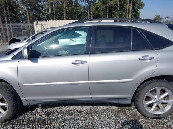 2008 Lexus RX with VIN 2T2HK31U38C069679, listed as a IAAI auction lot 42119684 with 134,196 mi miles. Bid and sale history available at carsss.com. Image 14.