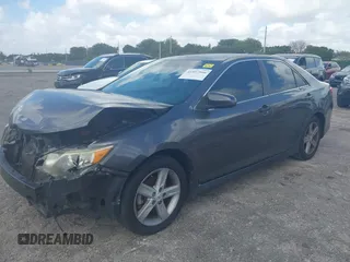 2012 Toyota Camry L with VIN 4T1BF1FK1CU165165, listed as a IAAI auction lot 41957566 with 127,048 mi miles. Bid and sale history available at carsss.com. Image 2.