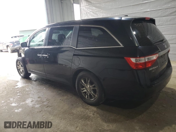 2012 Honda Odyssey EX-L with VIN 5FNRL5H6XCB100522, listed as a Copart auction lot 51431335 with 113,889 mi miles and Salvage Title. Bid and sale history available at DreamBid. Image 2.