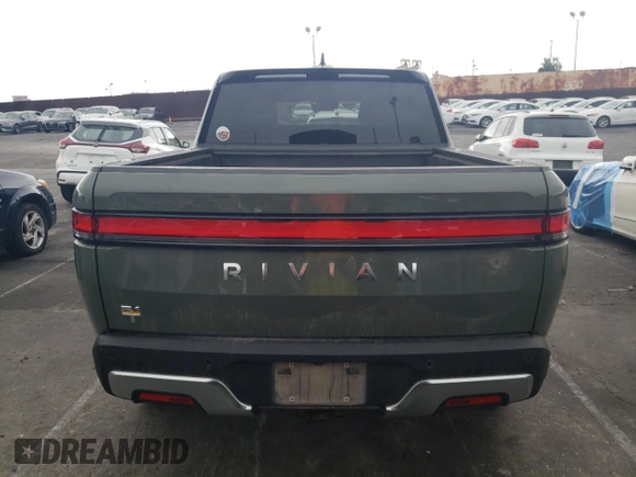 2022 Rivian R1T Launch Edition z VIN 7FCTGAAL0NN001256, wystawiony jako Copart lot #55850845 z przebiegiem 49 236 mil mil oraz Szkoda całkowita • Salvage title. Historia ofert i sprzedaży dostępna na DreamBid. Obrazek 6.