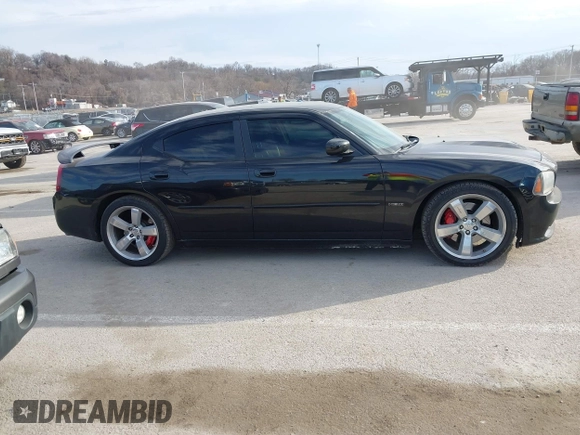 2006 Dodge Charger SRT-8 with VIN 2B3LA73W96H371246, listed as a IAAI auction lot 41676168 with 130,064 mi miles and . Bid and sale history available at carsss.com. Image 13.