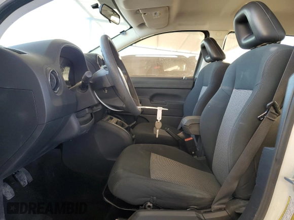 2009 Jeep Compass North with VIN 1J4FT47B79D160392, listed as a Copart auction lot 87213674 with 79,625 mi miles and Salvage Title. Bid and sale history available at carsss.com. Image 7.