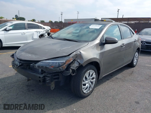2018 Toyota Corolla L with VIN 5YFBURHE6JP774827, listed as a IAAI auction lot 42598086 with 29,400 mi miles and . Bid and sale history available at DreamBid. Image 17.