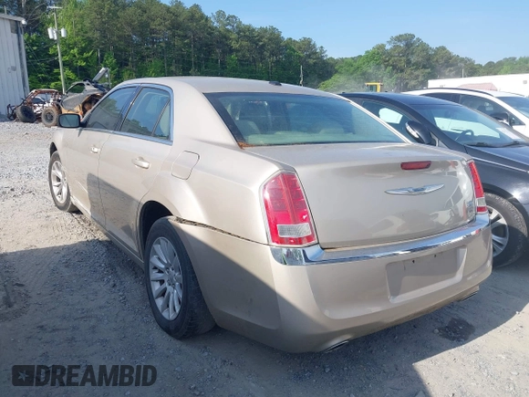 2012 Chrysler 300 with VIN 2C3CCAAG8CH261449, listed as a IAAI auction lot 42126170 with 189,961 mi miles and . Bid and sale history available at DreamBid. Image 3.