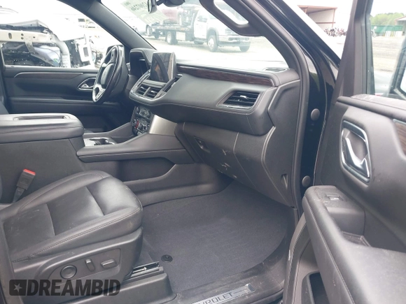 2022 Chevrolet Suburban Z71 with VIN 1GNSKDKD7NR345224, listed as a IAAI auction lot 42007246 with 50,300 mi miles and . Bid and sale history available at DreamBid. Image 5.