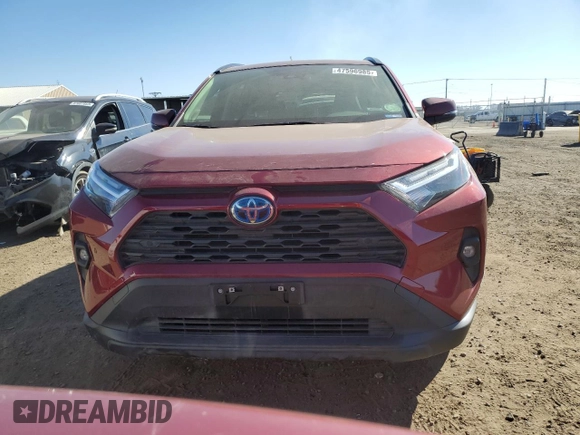2024 Toyota RAV4 Hybrid XLE Premium with VIN JTMB6RFVXRD120389, listed as a Copart auction lot 47596985 with 16,956 mi miles and Salvage Title. Bid and sale history available at DreamBid. Image 5.