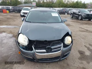 2008 Volkswagen Jetta SE z VIN 3VWRM71K18M135790, wystawiony jako IAAI lot #42165888 z przebiegiem 147 523 mil mil oraz . Historia ofert i sprzedaży dostępna na DreamBid. Obrazek 12.