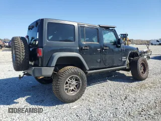 2014 Jeep Wrangler Unlimited Sport with VIN 1C4BJWDG9EL250326, listed as a Copart auction lot 48545705 with 247,460 mi miles and Salvage Title. Bid and sale history available at DreamBid. Image 3.