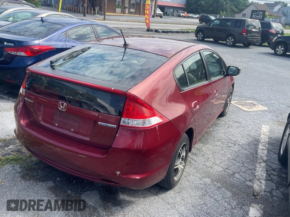 2010 Honda Insight LX с VIN JHMZE2H59AS032860, выставлен на аукционе Copart как лот 64378915 с пробегом 253 555 миль миль и Чистый • Clean title. История ставок и продаж доступна на DreamBid. Изображение 4.