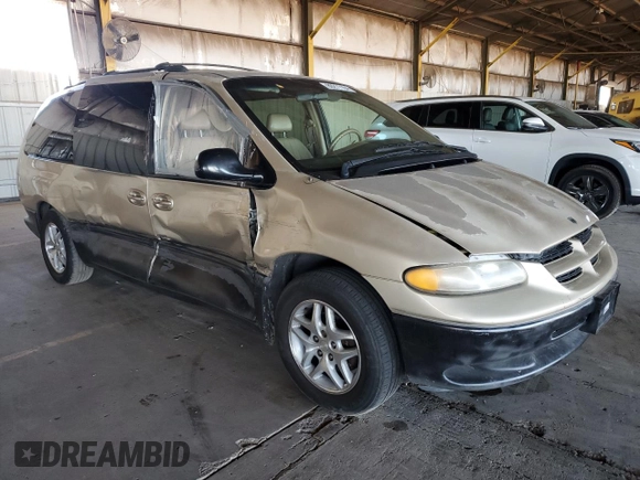 1998 Dodge Caravan LE with VIN 1B4GP54LXWB743058, listed as a Copart auction lot 80271164 with 192,048 mi miles and Salvage title. Bid and sale history available at DreamBid. Image 4.