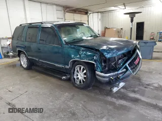 1998 GMC Yukon with VIN 1GKEC13RXWJ731667, listed as a Copart auction lot 78848954 with 202,164 mi miles and Salvage Title. Bid and sale history available at carsss.com. Image 4.