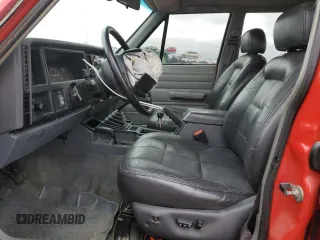 1996 Jeep Cherokee SE z VIN 1J4FJ28S3TL176627, wystawiony jako Copart lot #48173785 z przebiegiem 310 444 mil mil oraz Szkoda całkowita • Salvage title. Historia ofert i sprzedaży dostępna na DreamBid. Obrazek 7.