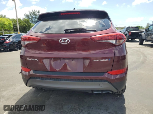 2016 Hyundai Tucson Limited z VIN KM8J33A25GU140802, wystawiony jako Copart lot #56249745 z przebiegiem 86 976 mil mil oraz Szkoda całkowita • Salvage title. Historia ofert i sprzedaży dostępna na DreamBid. Obrazek 6.
