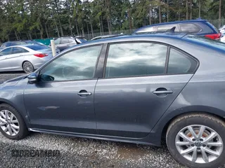 2011 Volkswagen Jetta SE z VIN 3VWDZ7AJXBM356668, wystawiony jako IAAI lot #42294221 z przebiegiem 199 605 mil mil oraz . Historia ofert i sprzedaży dostępna na DreamBid. Obrazek 14.