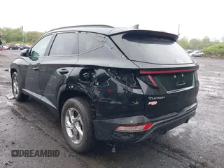 2022 Hyundai Tucson SEL z VIN 5NMJBCAE9NH015906, wystawiony jako IAAI lot #42169136 z przebiegiem 28 009 mil mil oraz . Historia ofert i sprzedaży dostępna na DreamBid. Obrazek 6.