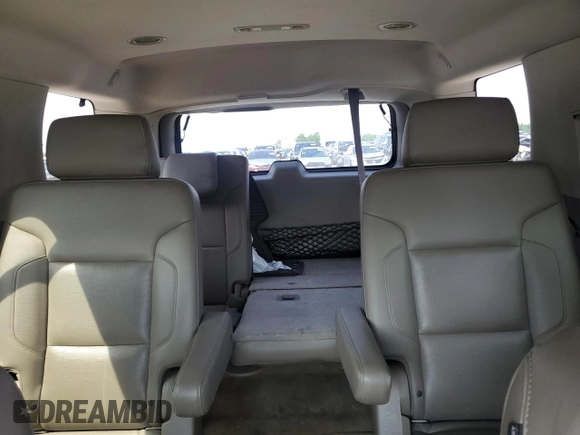 2015 Chevrolet Tahoe LTZ with VIN 1GNSCCKC2FR693500, listed as a Copart auction lot 60225195 with 206,210 mi miles and Salvage title. Bid and sale history available at DreamBid. Image 10.