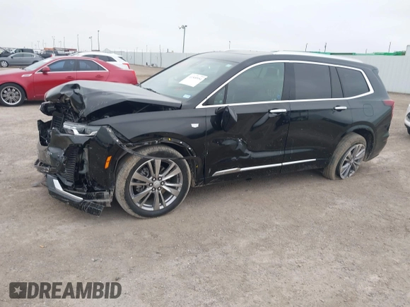 2023 Cadillac XT6 FWD Premium Luxury with VIN 1GYKPCRS8PZ231089, listed as a IAAI auction lot 41500954 with 36,455 mi miles and . Bid and sale history available at DreamBid. Image 6.