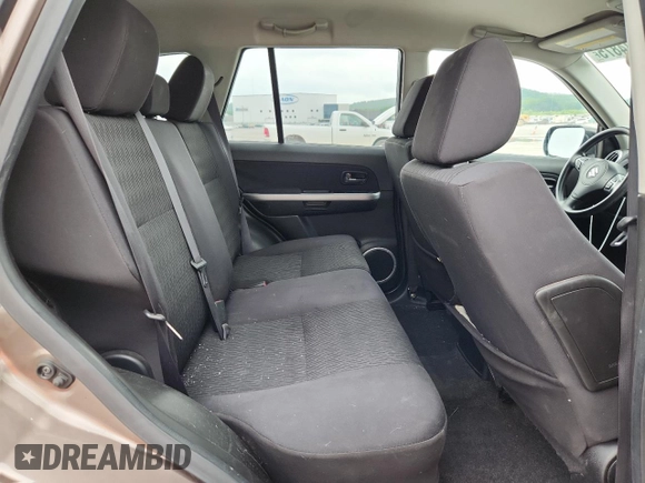 2013 Suzuki Grand Vitara Premium с VIN JS3TE0D60D4100144, выставлен на аукционе Copart как лот 60784875 с пробегом 91 842 миль миль и Списание • Salvage title. История ставок и продаж доступна на DreamBid. Изображение 10.