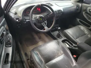 1998 Acura Integra LS with VIN JH4DC4359WS009556, listed as a Copart auction lot 84032334 with 244,851 mi miles and Salvage title. Bid and sale history available at DreamBid. Image 8.