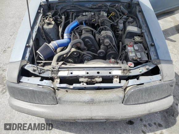 1988 Ford Mustang z VIN 1FABP44A1JF228656, wystawiony jako Copart lot #49451215 z przebiegiem 42 754 mil mil oraz Czysty tytuł • Clean title. Historia ofert i sprzedaży dostępna na DreamBid. Obrazek 11.