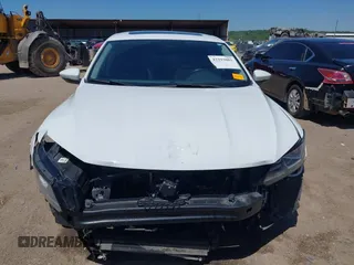 2019 Volkswagen Passat Wolfsburg Edition z VIN 1VWLA7A36KC008789, wystawiony jako IAAI lot #42293081 z przebiegiem 79 354 mil mil oraz . Historia ofert i sprzedaży dostępna na DreamBid. Obrazek 13.