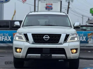 2017 Nissan Armada SV z VIN JN8AY2NC7H95049XX, wystawiony jako Copart lot #61907525 z przebiegiem 131 364 mil mil oraz Czysty tytuł • Clean title. Historia ofert i sprzedaży dostępna na DreamBid. Obrazek 7.