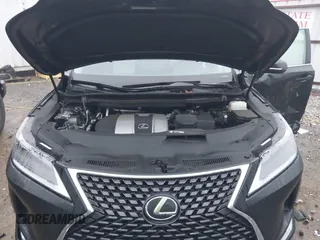 2022 Lexus RX with VIN 2T2HZMDA8NC314667, listed as a IAAI auction lot 41186876 with 30,493 mi miles. Bid and sale history available at carsss.com. Image 10.
