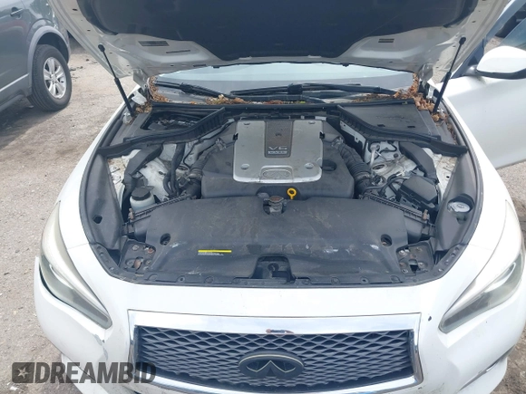 2015 Infiniti Q50 Premium with VIN JN1BV7AR5FM390985, listed as a IAAI auction lot 42641031 with 117,060 mi miles and . Bid and sale history available at DreamBid. Image 10.