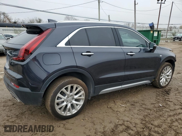 2022 Cadillac XT4 AWD Premium Luxury with VIN 1GYFZDR42NF147920, listed as a Copart auction lot 84058554 with 12,145 mi miles and Salvage Title. Bid and sale history available at carsss.com. Image 3.
