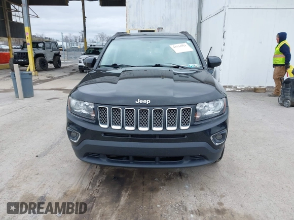 2016 Jeep Compass Latitude with VIN 1C4NJDEB8GD695268, listed as a IAAI auction lot 41724921 with 137,118 mi miles. Bid and sale history available at carsss.com. Image 12.
