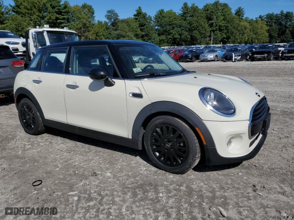 2019 MINI Hardtop 4 Door Cooper with VIN WMWXU1C56K2H74308, listed as a Copart auction lot 73110974 with 76,307 mi miles and Salvage Title. Bid and sale history available at carsss.com. Image 4.