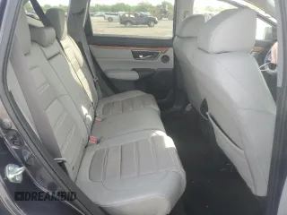 2018 Honda CR-V Touring z VIN 7FARW2H94JE077885, wystawiony jako Copart lot #55451345 z przebiegiem 133 964 mil mil oraz Szkoda całkowita • Salvage title. Historia ofert i sprzedaży dostępna na DreamBid. Obrazek 10.