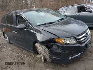 2016 Honda Odyssey SE with VIN 5FNRL5H39GB155488, listed as a IAAI auction lot 41702336 with 122,164 mi miles. Bid and sale history available at carsss.com. Image 1.