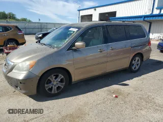 2010 Honda Odyssey Touring с VIN 5FNRL3H9XAB096841, выставлен на аукционе Copart как лот 56925755 с пробегом 226 814 миль миль и На запчасти • Non repairable. История ставок и продаж доступна на DreamBid. Изображение 1.