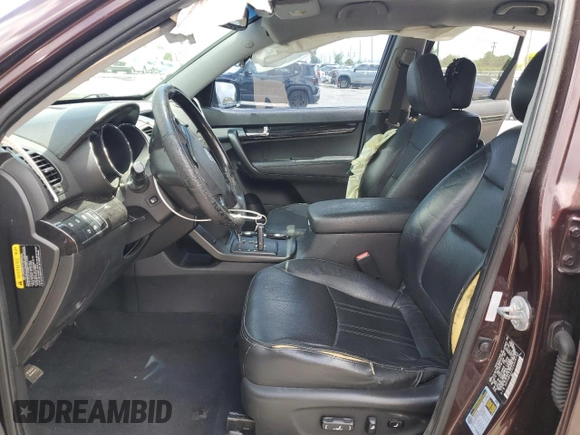 2012 Kia Sorento SX with VIN 5XYKW4A29CG308152, listed as a Copart auction lot 64895355 with 126,816 mi miles and Salvage title. Bid and sale history available at DreamBid. Image 7.