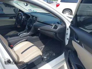 2017 Honda Civic EX-L z VIN 19XFC1F78HE008832, wystawiony jako IAAI lot #42455986 z przebiegiem 103 466 mil mil oraz . Historia ofert i sprzedaży dostępna na DreamBid. Obrazek 5.
