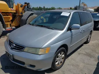 2004 Honda Odyssey EX z VIN 5FNRL18624B007438, wystawiony jako IAAI lot #42441043 z przebiegiem 208 480 mil mil oraz . Historia ofert i sprzedaży dostępna na DreamBid. Obrazek 6.