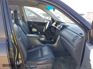 2003 Honda Pilot EX with VIN 2HKYF18603H544943, listed as a IAAI auction lot 41726443 with 178,413 mi miles. Bid and sale history available at carsss.com. Image 5.