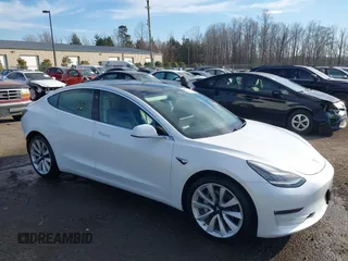 2019 Tesla Model 3 Long Range with VIN 5YJ3E1EB7KF442390, listed as a IAAI auction lot 41700122 with 65,539 mi miles. Bid and sale history available at carsss.com. Image 1.