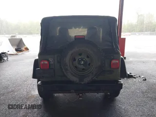 2005 Jeep Wrangler X z VIN 1J4FA39S75P310037, wystawiony jako IAAI lot #42186114 z przebiegiem 154 462 mil mil oraz . Historia ofert i sprzedaży dostępna na DreamBid. Obrazek 16.