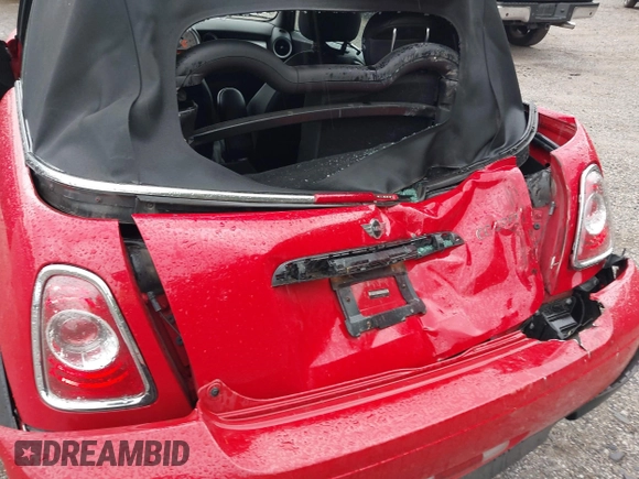 2011 MINI Convertible with VIN WMWZN3C59BTZ89447, listed as a IAAI auction lot 42313009 with 62,009 mi miles and . Bid and sale history available at DreamBid. Image 6.