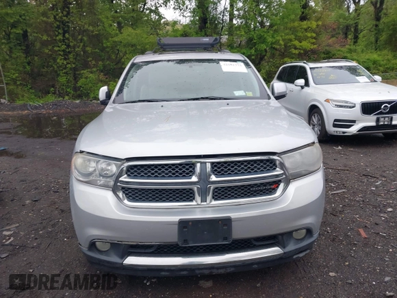 2013 Dodge Durango Crew with VIN 1C4SDJDT8DC565608, listed as a IAAI auction lot 42181773 with 161,485 mi miles and . Bid and sale history available at DreamBid. Image 12.