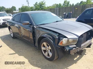 2014 Dodge Charger SXT z VIN 2C3CDXHG3EH288258, wystawiony jako IAAI lot #42418459 z przebiegiem 217 279 mil mil oraz . Historia ofert i sprzedaży dostępna na DreamBid. Obrazek 1.