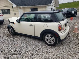 2008 MINI Hardtop with VIN WMWMF33508TT65360, listed as a Copart auction lot 58693445 with 105,783 mi miles and Salvage title. Bid and sale history available at DreamBid. Image 2.