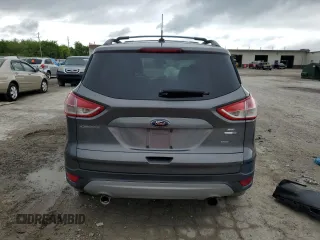 2013 Ford Escape SE с VIN 1FMCU9GX4DUA96010, выставлен на аукционе Copart как лот 57591945 с пробегом 162 760 миль миль и Списание • Salvage title. История ставок и продаж доступна на DreamBid. Изображение 6.