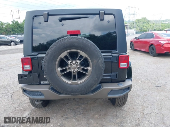 2016 Jeep Wrangler Unlimited Sahara z VIN 1C4HJWEG3GL343340, wystawiony jako IAAI lot #42683859 z przebiegiem 92 878 mil mil oraz . Historia ofert i sprzedaży dostępna na DreamBid. Obrazek 17.